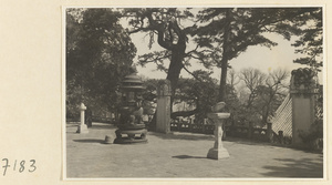 Terrace with incense burner, stone stelae, and sundial at Jie tai si