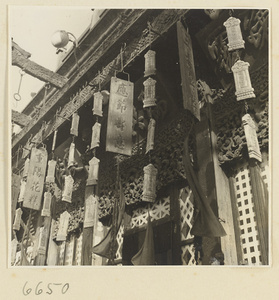 Facade of a pastry shop showing shop signs