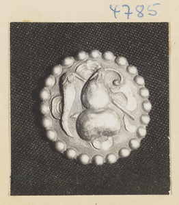 Silver button with relief work showing the attributes of Li Tieguai, one of the eight Daoist immortals