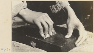 Furniture-maker working on a box, Furniture Street, Peking