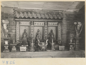 Altar with shrine figures and inscriptions at a tile and brick factory near Mentougou Qu