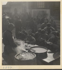 Street vendor selling food at a food stand at New Year's