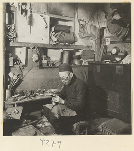 Man at work in a metal-working shop