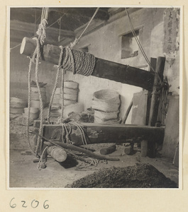 Tobacco shop interior showing a tobacco press