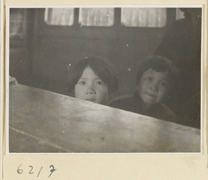 Tobacco shop interior showing two girls at a counter