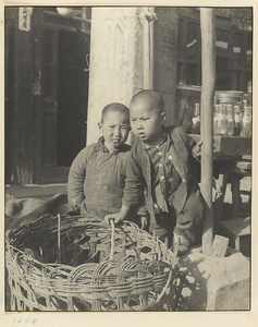 Two boys with a basket