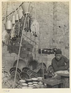 Street vendor selling household goods