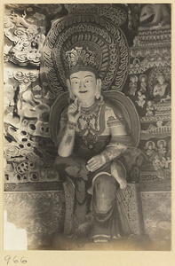 Interior detail of a cave temple at Yun'gang showing a niche with a seated Bodhisattva