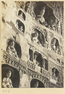 Interior view of a cave temple at Yun'gang showing niches with Buddhist reliefs