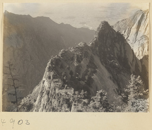 North Peak Ridge with Daoist monastery buildings on Hua Mountain and Yellow River in background