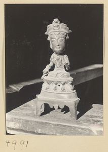 Bronze statue of the goddess Guanyin in a Daoist temple on Hua Mountain