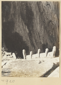 Stone parapet on narrow trail skirting the Great Creater on Hua Mountain