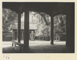 Rock in a courtyard between two temple buildings at the Kong miao