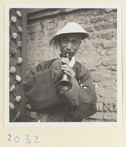 Musician playing a suo na at a wedding