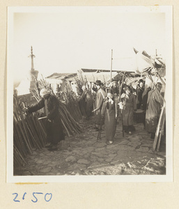 Pilgrims buying peach-wood walking sticks on the trail up Miaofeng Mountain