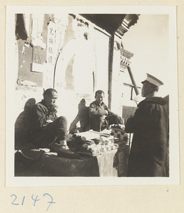 Men at an incense stand on Miaofeng Mountain