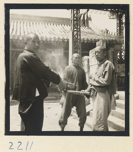 Pilgrims lighting incense on Miaofeng Mountain