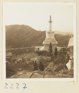 Stupa-style pagoda, incense burner, and pilgrims on Miaofeng Mountain
