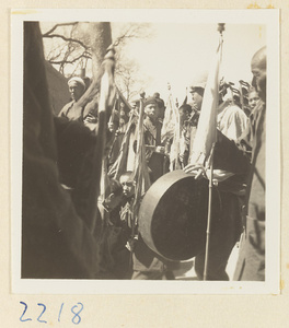 Pilgrims with flags on Miaofeng Mountain