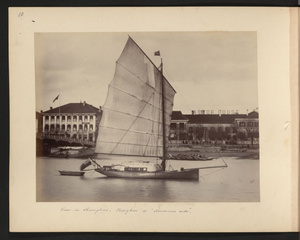 Junk-rigged cutter yacht and Astor House Hotel, Soochow Creek, Shanghai