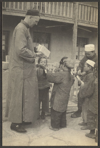 Mr. Learner distributing Christian tracts to Muslim school children in Xining