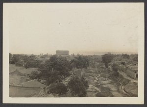 Westward ho.  City of Tungkuan from train looking toward North Gate & Yellow R.