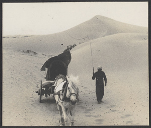 Out into the desert beyond the Great Wall.  A strong wind made going hard.