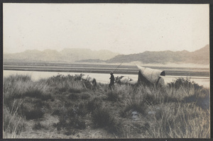 Crossing an arm of the Gobi, the Alashan Desert.  The Yin Mountains of the Odos Desert across the Yellow River from us.