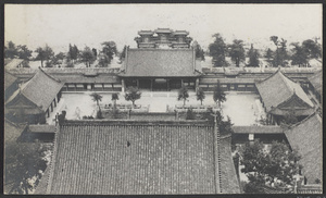 Summer Palace.  [Rooftops of Pai yun dian (foreground) and Pai yun men (middleground) and pai lou on the shore of Kunming Lake]