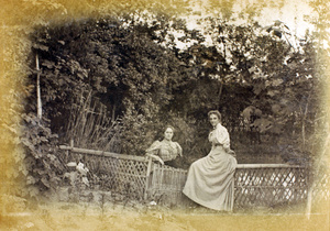Susan Wilcockson and Ethel Mary Maitland (née Wilcockson), by a garden fence