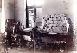 A silk inspection room and factory office, likely to be Arnhold, Karberg & Co., Shanghai