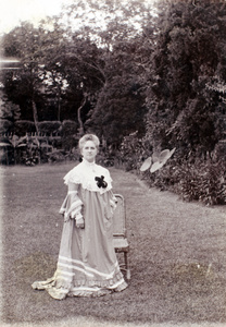 Susan Wilcockson on the lawn in a garden
