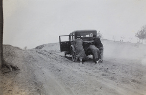 Pushing a car up a hill, near Chentow