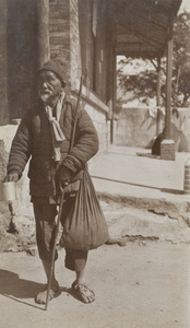 A blind man begging, Hong Kong