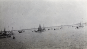 Boats and a buoy on the River Huangpu, Shanghai