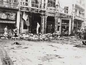 Aftermath of bombing, Avenue Edward VII and Yu Ya Ching Road, Shanghai, 14 August 1937