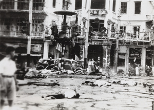 Aftermath of bombing, Avenue Edward VII and Yu Ya Ching Road, Shanghai, 14 August 1937