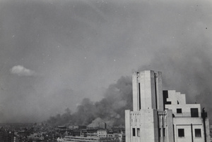 Thick smoke over Shanghai, 1937, and part of the Metropole Hotel