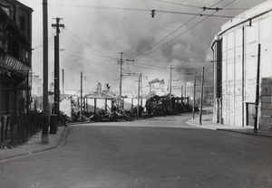 Thick smoke and bomb damaged buildings, Shanghai, 1937