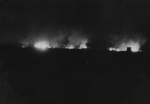 Fires burning at night, Shanghai, 1937