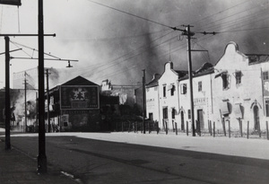 Thick smoke rising above bomb damaged properties, Shanghai, 1937