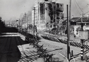 [Japanese] soldiers observed from Boundary Road guard post near Shanghai North Railway buildings, 1937