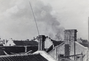 Smoke rising after bombing, Shanghai, 1937