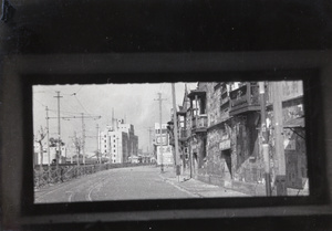 Street view of Boundary Road looking toward Shanghai North Railway administration building, 1937
