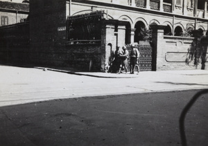 Three Japanese marines at the corner of Range Road and North Kiangse Road, Shanghai, August 1937