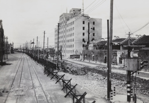 Barricades and anti-tank measures on Boundary Road, and Shanghai North Railway Administration Building, Zhabei, Shanghai, 1937