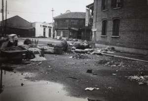 Makeshift barricades near engineering and steel works, Shanghai, 1937