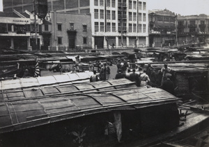 Representatives of British, American, French, and Japanese military in negotiation, Soochow Creek, Shanghai, October 1937