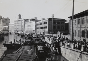 Japanese marines requisitioning Chinese boats, Soochow Creek near Chekiang Road Bridge, Shanghai, October 1937