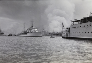Burning of Nanshi, Shanghai, November 1937 (An Italian gunboat and H.M.S. Cumberland in middle distance)
